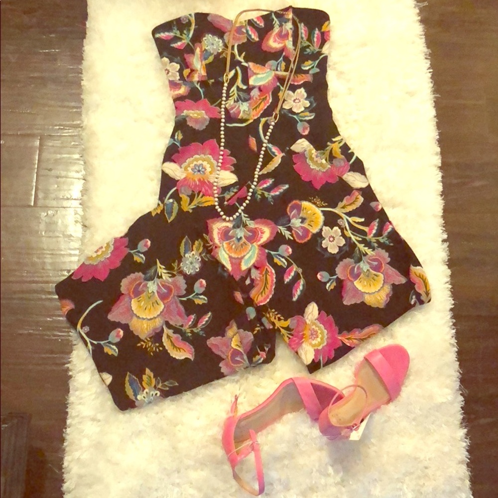 Brand new (without tags) sleeveless romper.